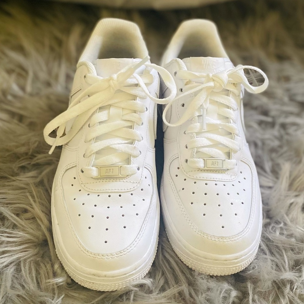 All white Air Force 1 ‘07 sneakers